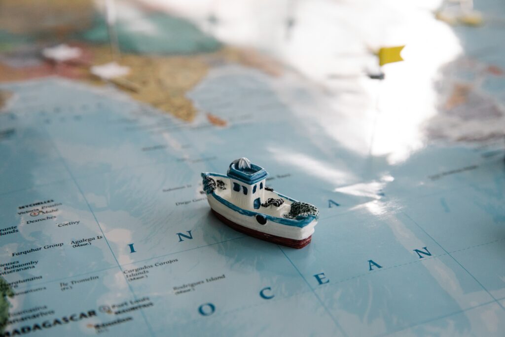 toy ship on a map