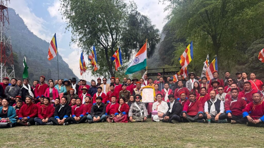 A large group of people posing for a photo. Tawang Freedom Trail.