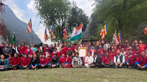 A large group of people posing for a photo. Tawang Freedom Trail.