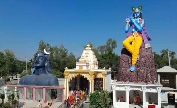 Statues of Krishna and Shiva stand beside the Shri Shri Radha Gobinda and Kali Temple in Palashbari, Gaibandha, where an unfinished Ram monument has become the focus of national attention.